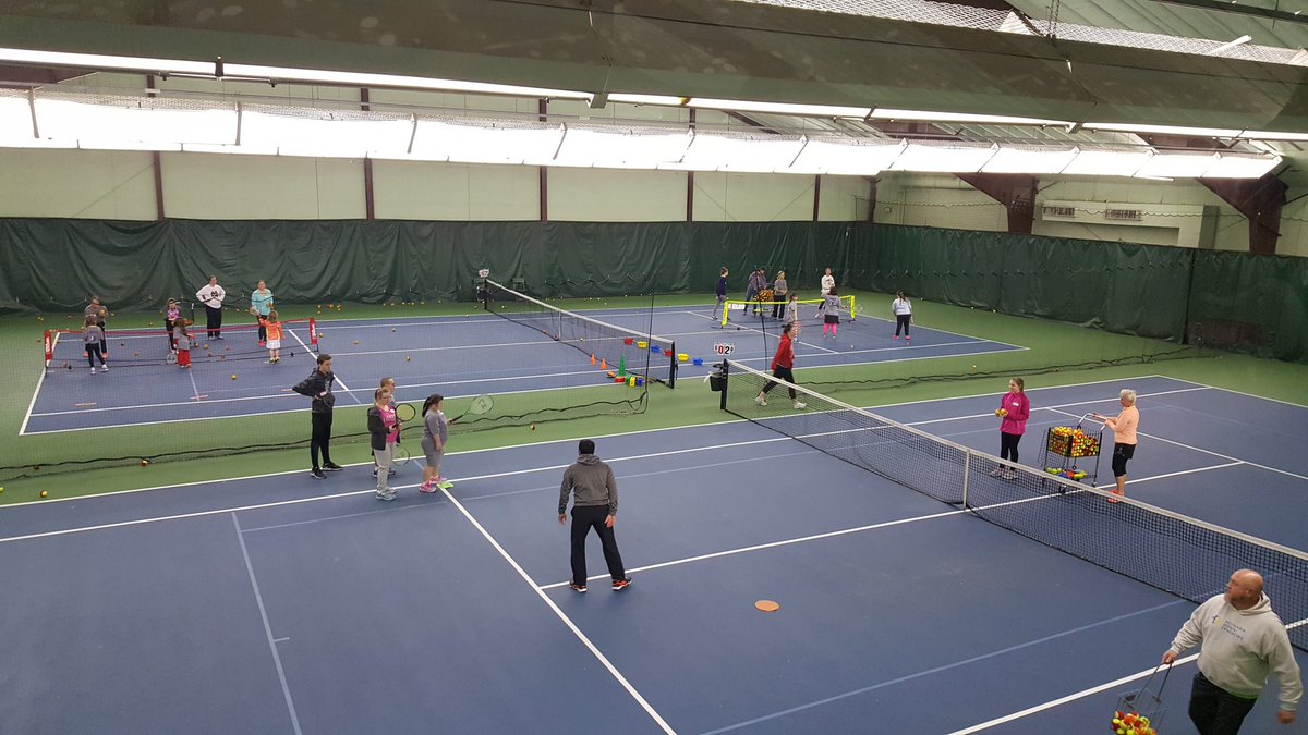 RobMKelly's tweet photo. Here at South Bend Racquet Club with @BuddyUpTennis and Michiana Down Syndrome for some morning tennis lessons. #Athletes #BUnified https://t.co/hkIdg1QLT3