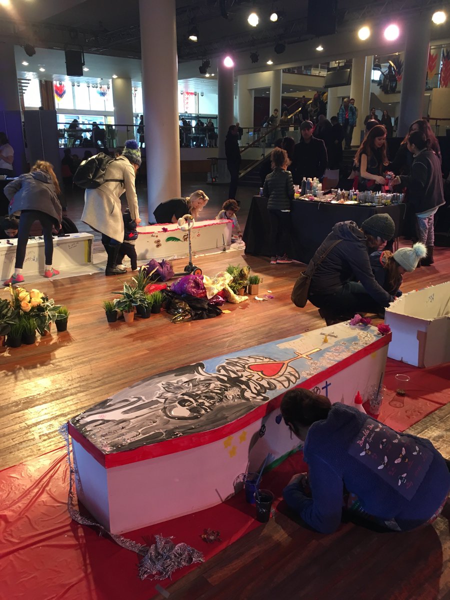 People of all ages decorating coffins with artist Lauren Baker @LaurenBakerArt #livingwithdeath #coffins