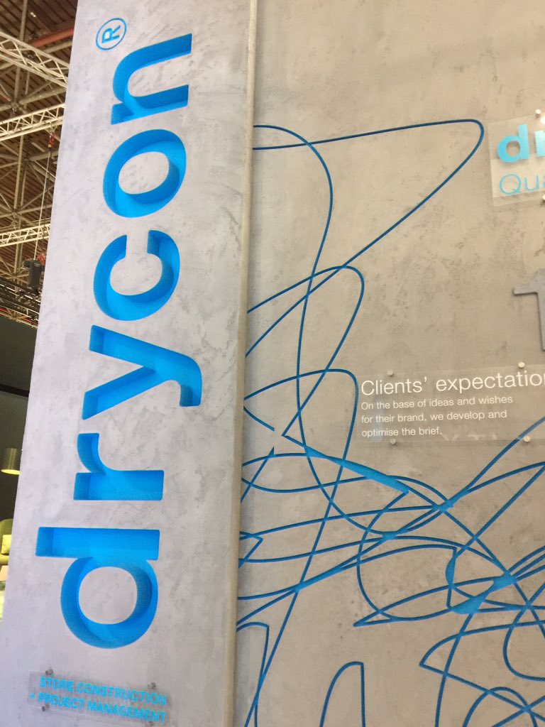 team_newenglish's tweet photo. @EuroShop, Düsseldorf visiting the stand we've designed for #drycon shopfitting. Concrete walls & floors bespoke wood lights and table, etc https://t.co/NHAolsa1ui