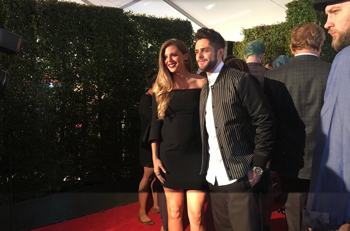 iHeartRadio's tweet image. #iHeartAwards performer @ThomasRhett poses w/ his wife Lauren before hitting the red carpet 💕