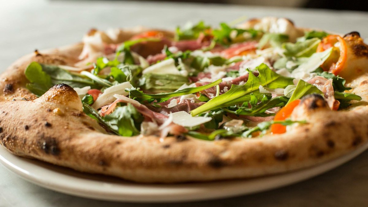 pizzuvio's tweet photo. Our specialty Arugula & Prosciutto pizza has a little something extra with a fresh arugula topping! Give it a try! #Pizzuvio https://t.co/2o8mufLgCx