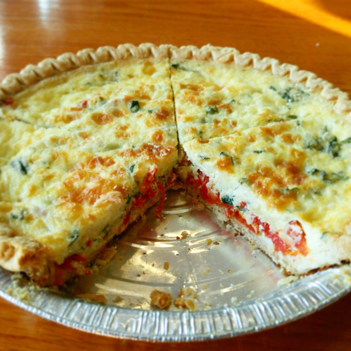 Today's Quiche is made with sun-dried tomatoes, fresh basil &amp; provolone cheese. Have a slice with a side for 8.99.  #keywest #freedelivery