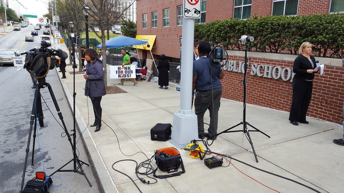 Fox5Juan's tweet photo. Parents are out in full effect protesting the school district. Watch @aungeliquefox5 and @MarissaMFOX5 on #fox5atl sorry all your local news https://t.co/LhZkJ2eI5m