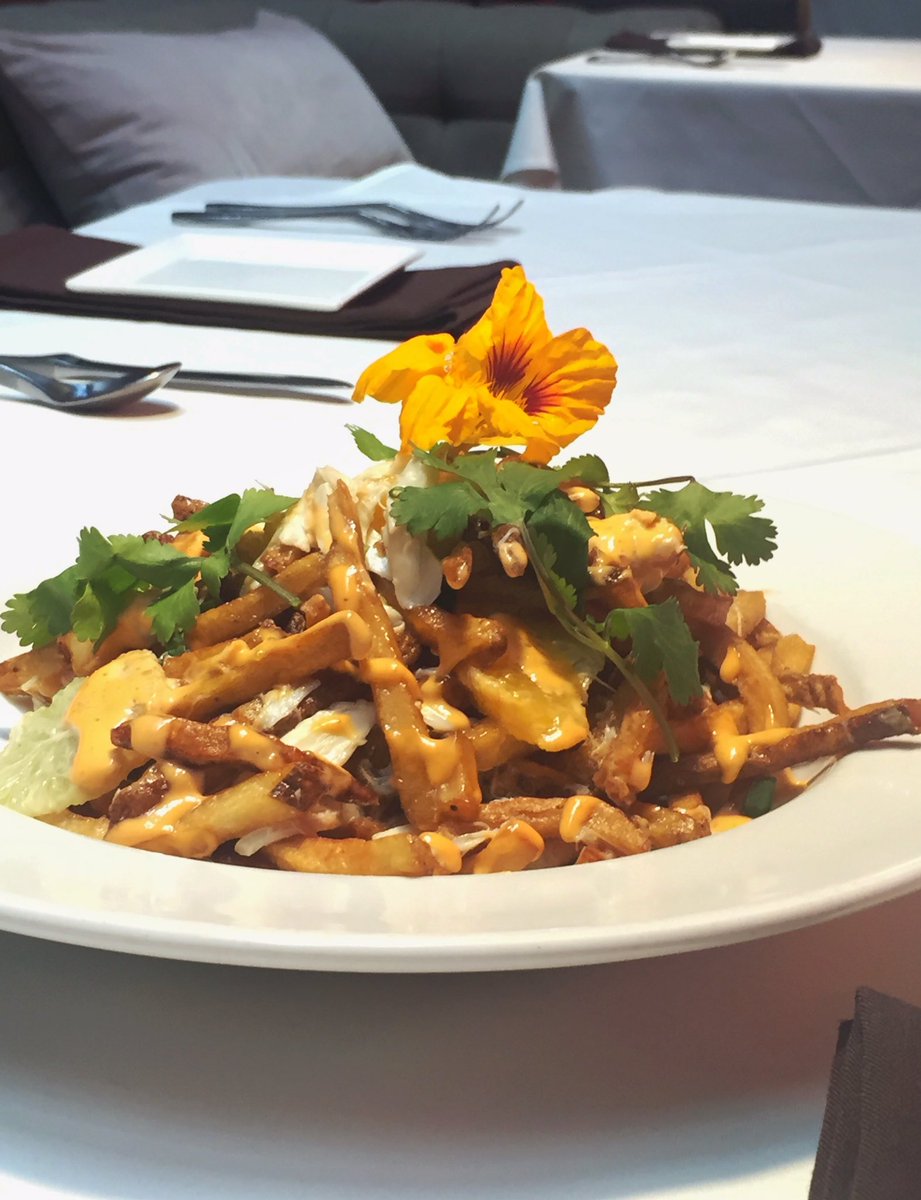 RedPrimeSteak's tweet photo. Come indulge tonight-Crab poutine coconut lime broth, citrus supremes, cilantro, and nasturtium flower. #redprimesteak #redprimespecials https://t.co/uBaQanr3WZ