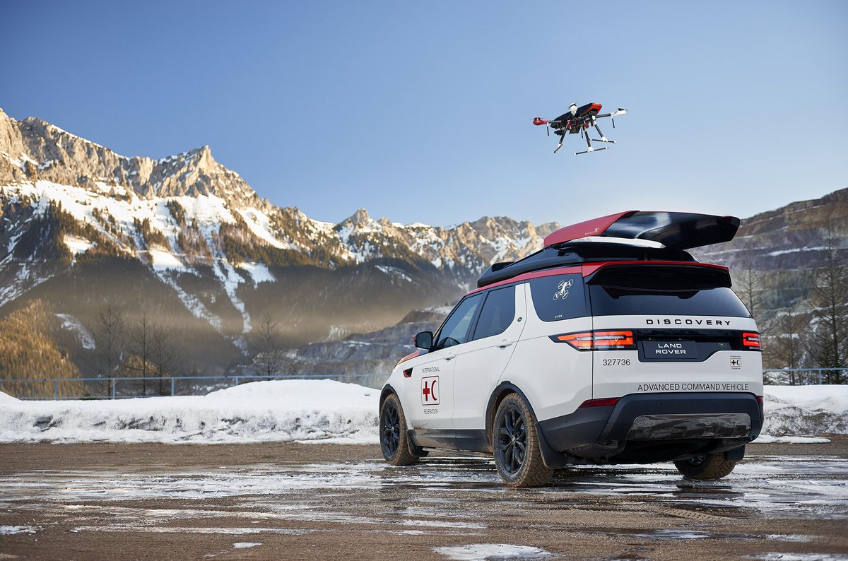 verge's tweet photo. Land Rover has created a special Discovery with a roof-mounted drone https://t.co/i28y5OzSbP https://t.co/6mskblXh7a