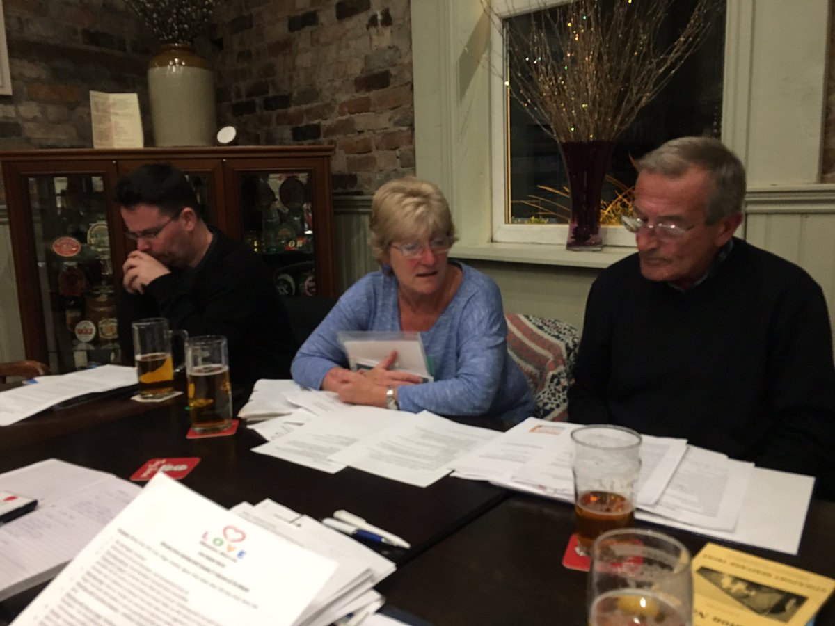 Committee members working hard before the monthly meeting of LHN!