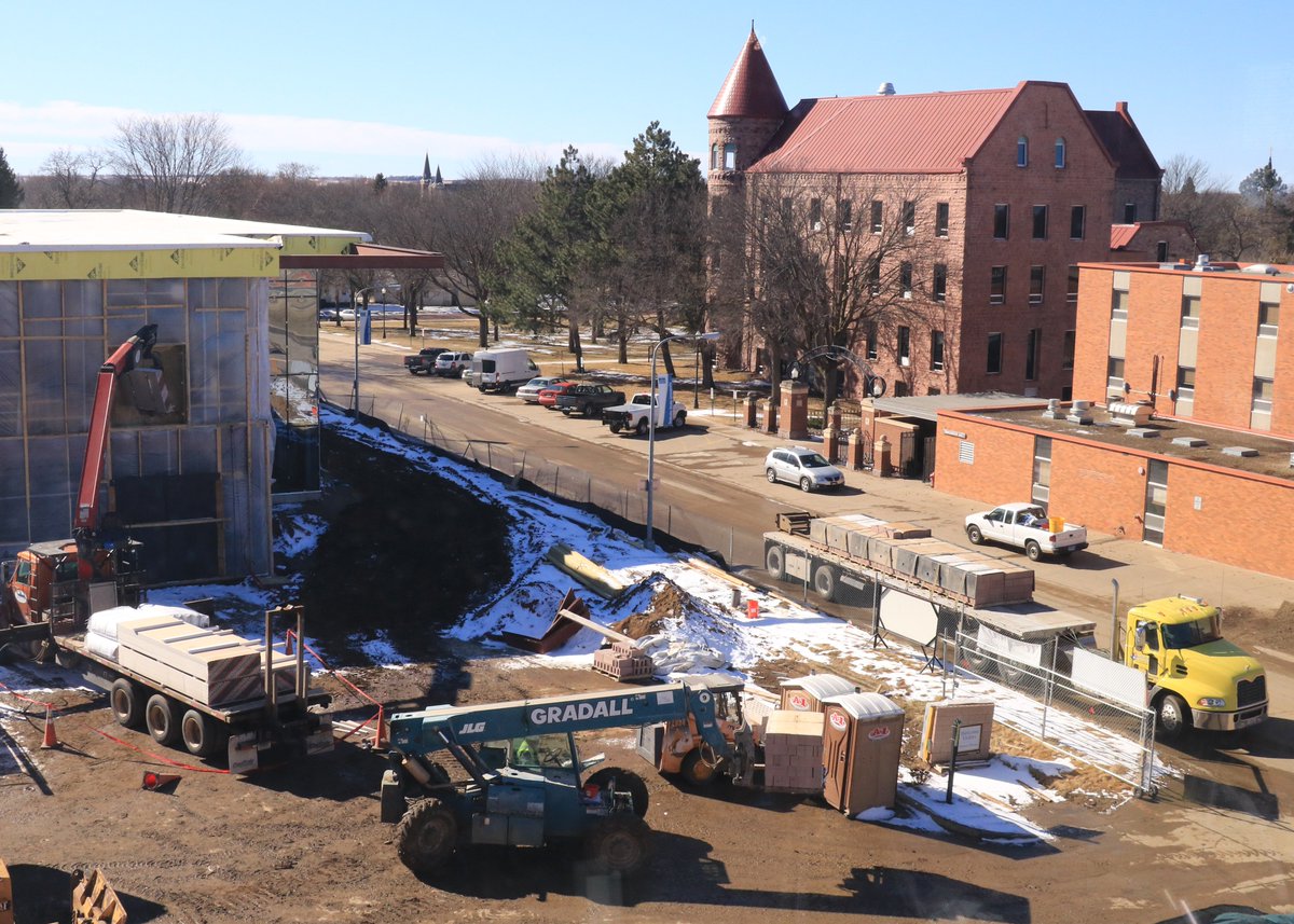 DakotaState's tweet photo. It's not spring break for the construction workers on campus. Deliveries to the Beacom building, kitchen moves in TC. #DSUCampusConstruction https://t.co/lPffH51uR8