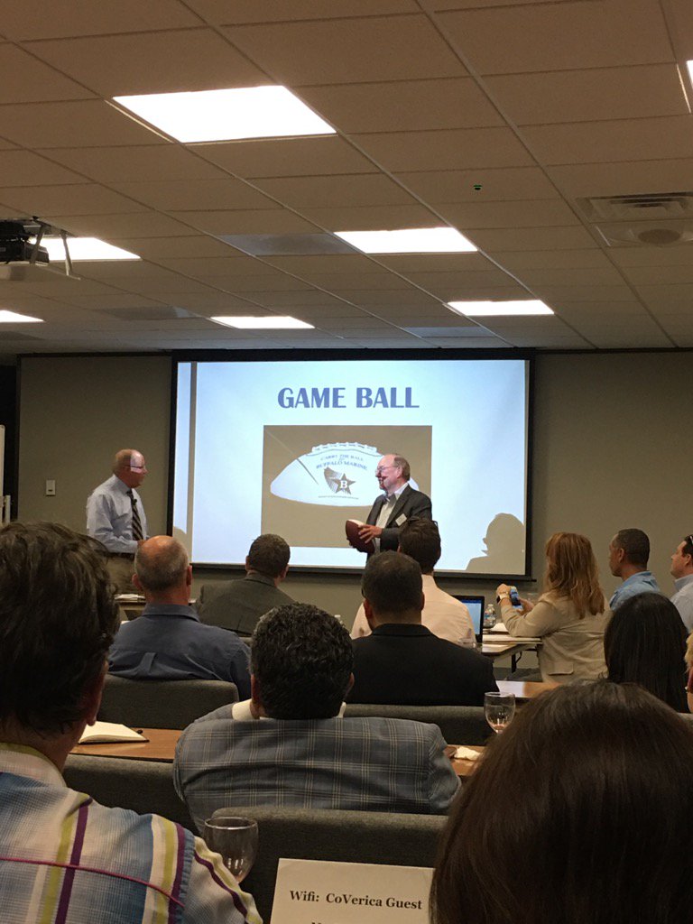 plumgroup's tweet photo. @BizOwnersEd Jay receives a game ball from Pat Studdert.  Amazing advice/talk from Coach Studdert. https://t.co/HR1dBi2J83