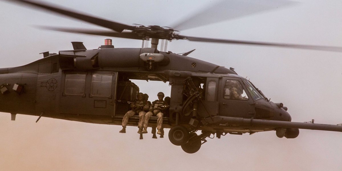 USMC's tweet photo. Hangin' Over the Edge

Marines with the @11thmeu lift off from a designated drop zone in a HH-60 Pave Hawk near Camp Lemonnier, Djibouti. https://t.co/gYSzzgoXfh