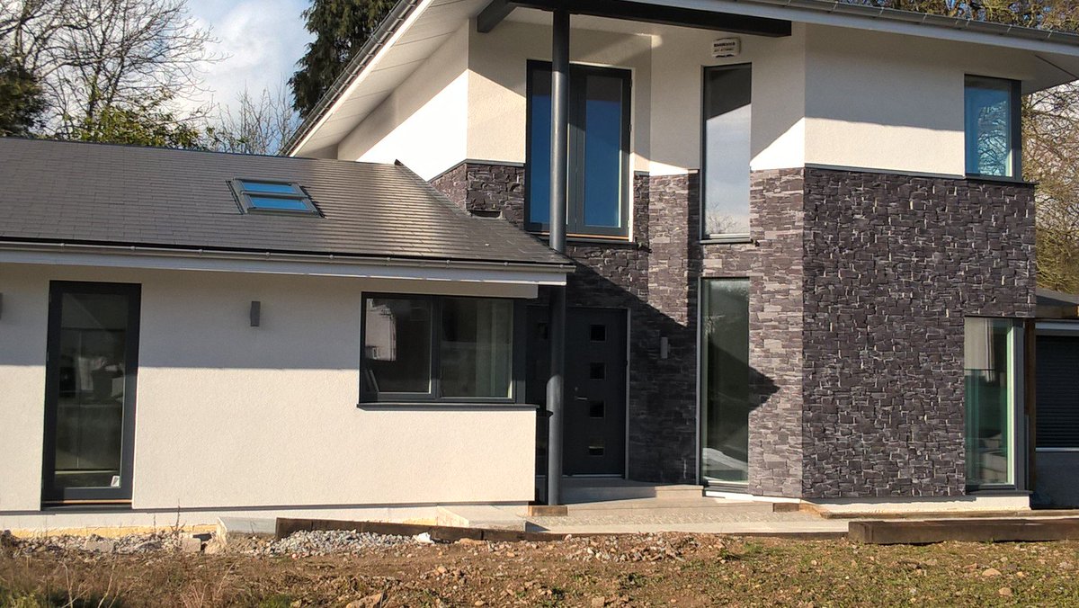 LBSproducts's tweet photo. Check out this new house in Ireland using #WelshSlate #ZStone . The unmistakable 'heather-blue' of real Welsh Slate. https://t.co/M9wxgNLVC5