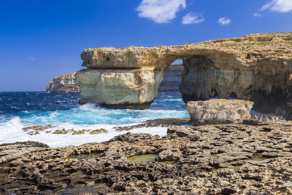 CNTraveler's tweet photo. Malta's iconic 'Azure Window' collapses due to heavy storms https://t.co/gGhtIsDc2S https://t.co/v2jfWRRXDY