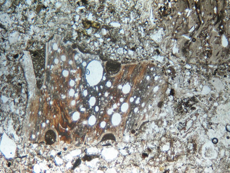Rock_Library's tweet photo. Like space ignimbrite - suevite, impact melt breccia from Ries crater (14Ma). The town is the same size as the asteroid #ThinSectionThursday https://t.co/fm3rotIaCc