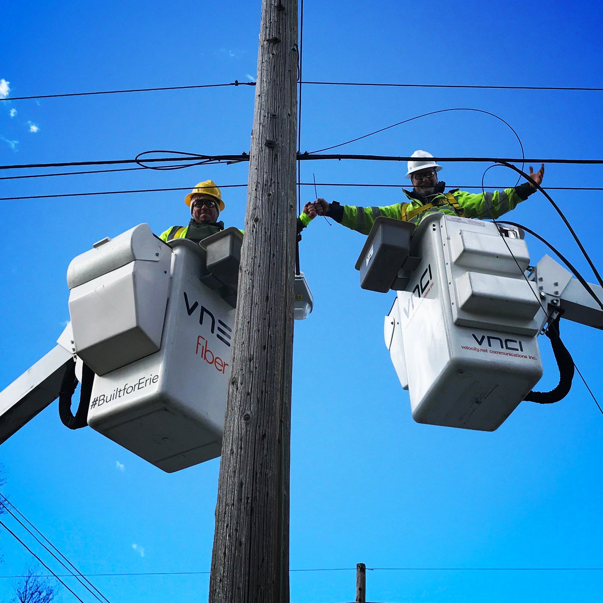 vnetfiber's tweet photo. Growing the fiber network with the power of the fist bump! #MyErie #BuiltforErie #teamwork https://t.co/hzc0BzX8IY