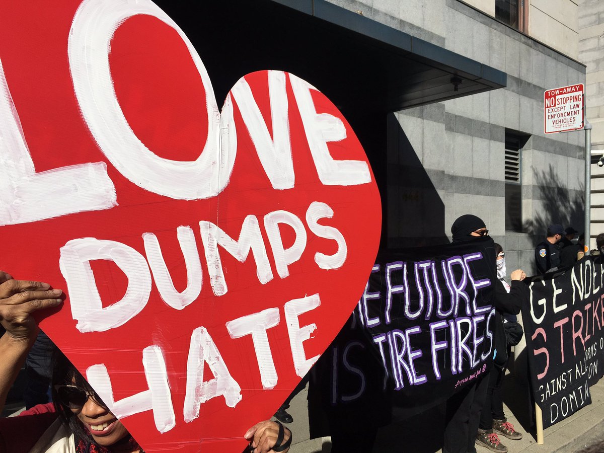 blakersdozen's tweet photo. Fave photo from today's #GenderStrike in SF: "Love dumps hate" and "The future is tire fires." https://t.co/yZOWtf7NrC
