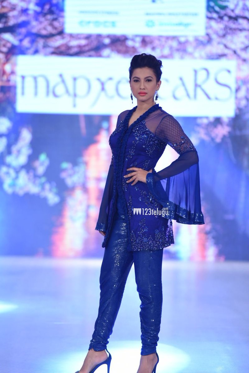gau_angel's tweet photo. #IBFW2017
@GAUAHAR_KHAN looks Sizzling displays the creation of fashion designers #Riddhi &amp; #SiddhiMapxencar during the Beach Fashion Week!♥ https://t.co/daRrLouLAd