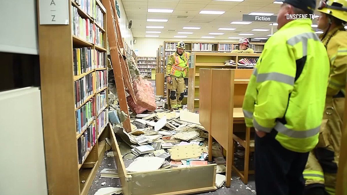 KTLA's tweet photo. Driver suspected of DUI after car plows into library in Downey, @erinmyers reports https://t.co/VKMUpysS0n https://t.co/gqzq74aaRk