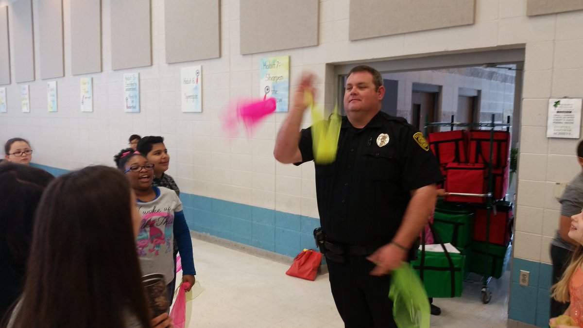 Officer Martin showing off his juggling skills <a href="/PelhamOaksPE/">PelhamOaksPhysicalEd</a>