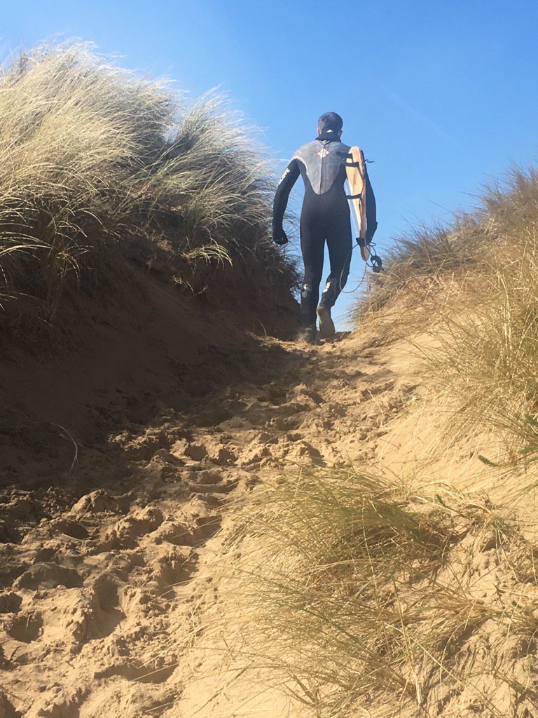 lisaannefearn's tweet photo. He couldn't wait any longer to get this board wet!! #Joshfearn #Rhossili #springsurf #crazy https://t.co/1l0cbRsYbH