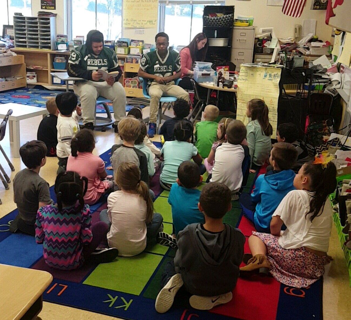 Rebel Readers - Rebel football players reading to the rising Rebels at Rockland Woods during Zero Period - one hour before school starts