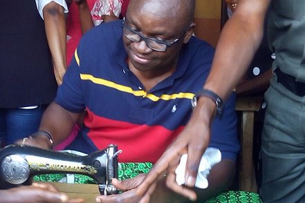 Governor Ayodele Fayose doing justice to one of the Ankara cloth chosen ahead of the world women's day celebration coming up on the 8th of March, 2017.
