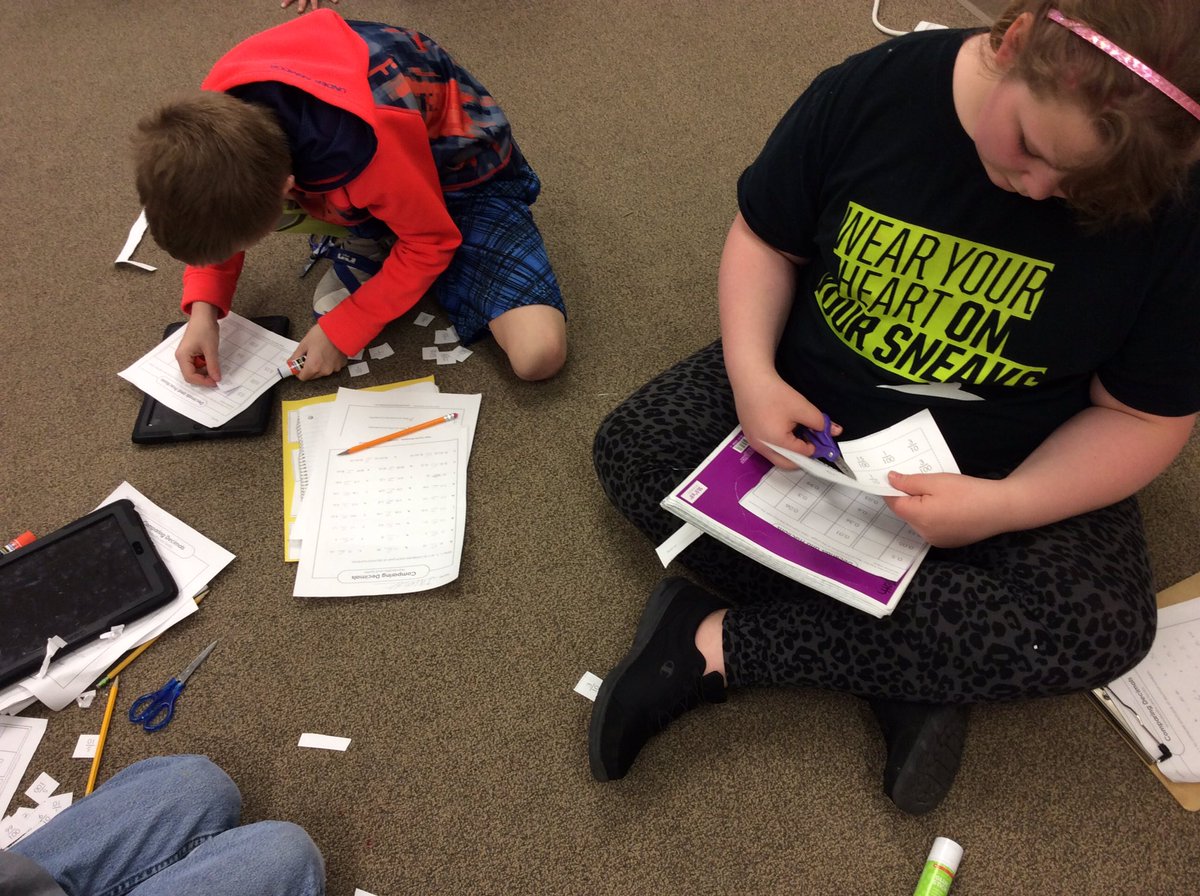 MissStone12's tweet photo. Decimal stations! Students are working cooperatively reviewing decimals. #essdexcels @LE_ESSD40 https://t.co/OVvb34tECj