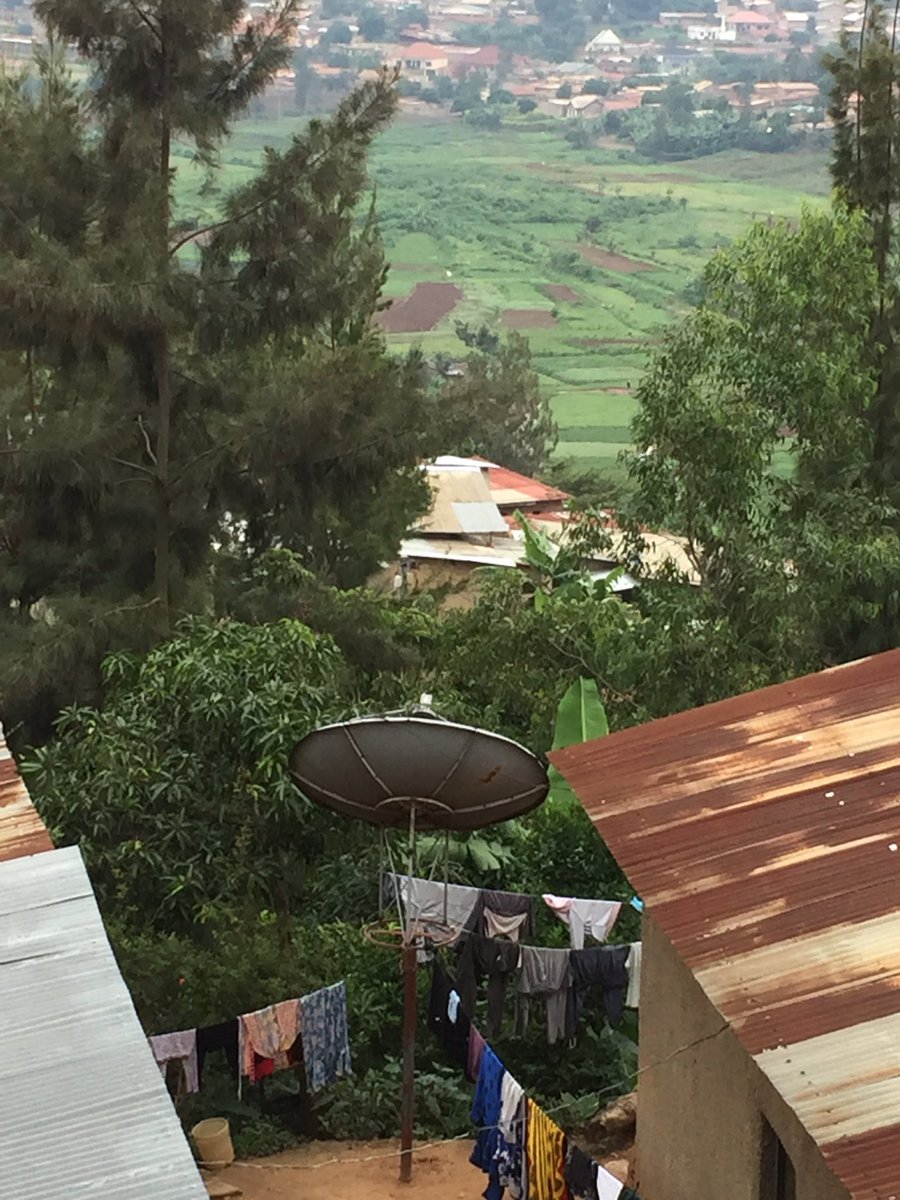 PearceOroz's tweet photo. Pit latrines and satellite dishes in Kigali's unplanned settlements (which make up 78% of this growing city). https://t.co/HRFXrbaThU