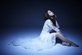 She sits down and wonders if she would ever find the love of her life. She sighs as she looks up at the stars.