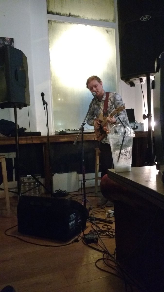 Connor now plus artsy coffee cup