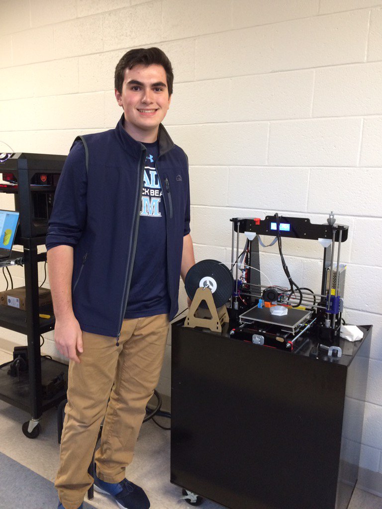 Our COT student shows the 3D printer he made himself tonight at Academic Showcase.
