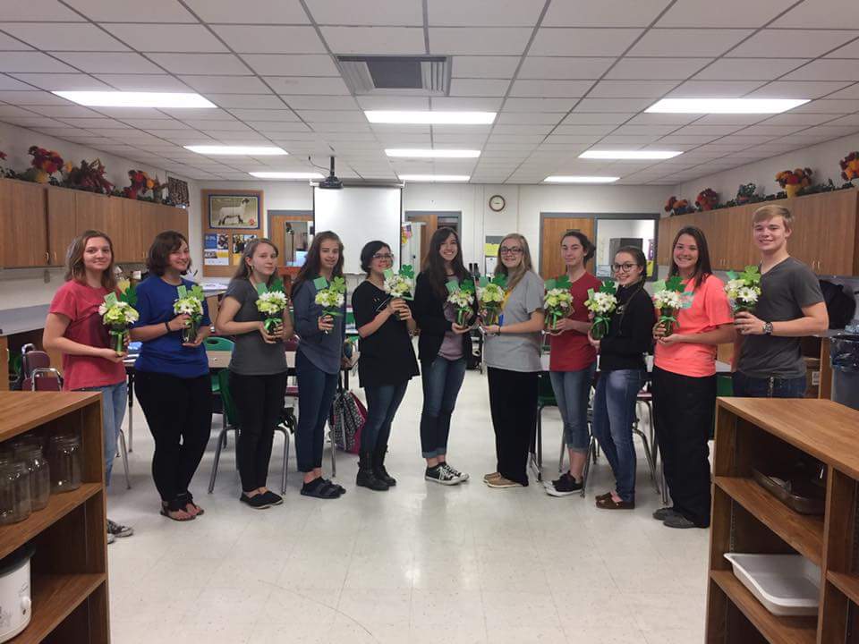 SantoHighSchool's tweet photo. Santo Floral Design did it again, creating festive St. Patrick's Day arrangements. So proud of these students &amp; the hard work they put in! https://t.co/fnCx3FoRQS