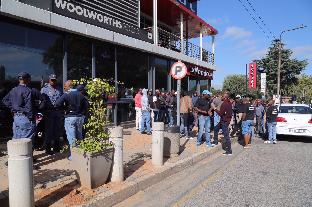 ChristaEybers's tweet image. #UberProtest Uber drivers are gathering at the company's head office in Parktown. CE