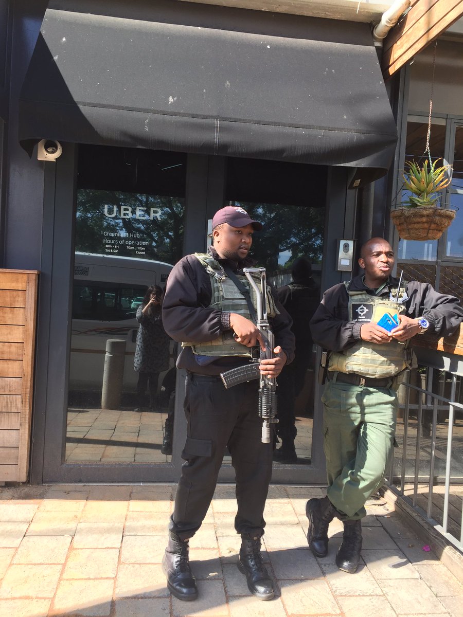 POWER987News's tweet image. #UberProtest Drivers unhappy with management, outside Uber offices in Parktown. Security and police monitoring