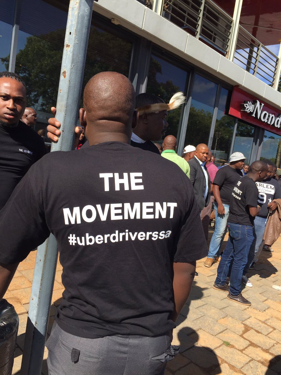 POWER987News's tweet image. #UberProtest Drivers unhappy with management, outside Uber offices in Parktown. Security and police monitoring