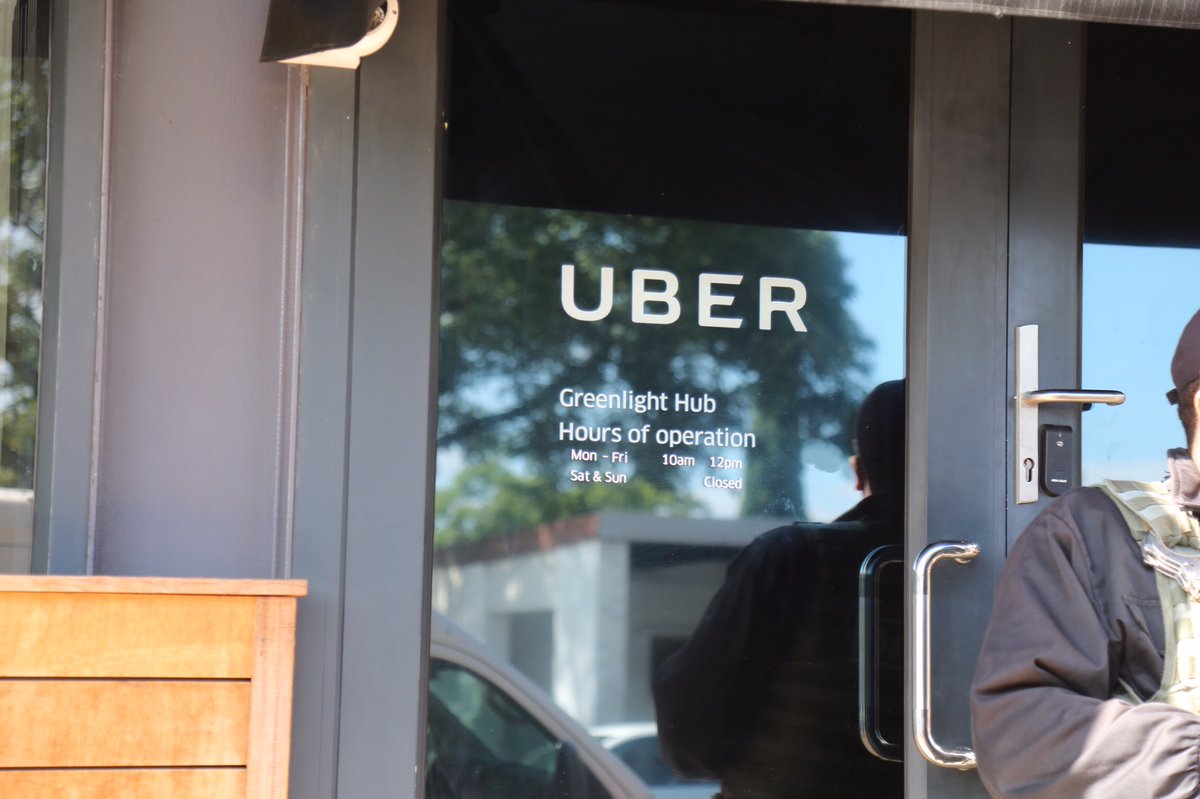 ewnreporter's tweet image. #UberProtest Security outside the Uber head office. CE