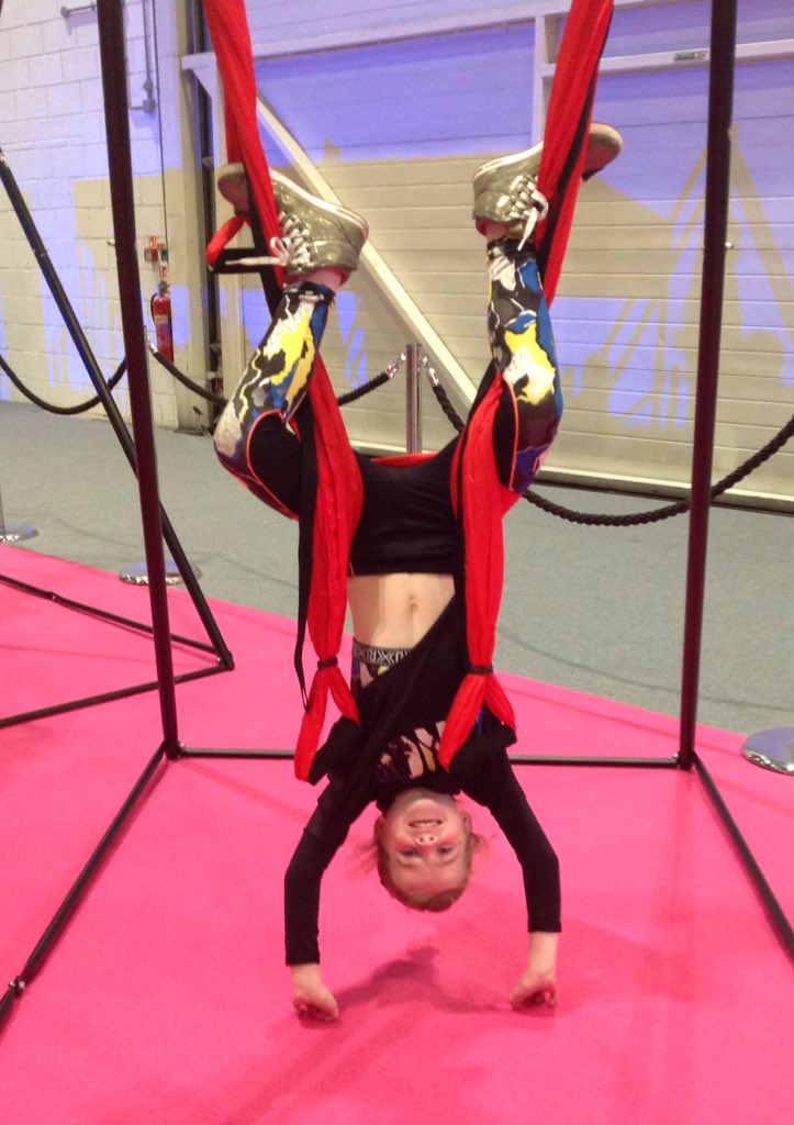 Try out ariel yoga with our Yoga Sponsor @YogaStudioUK at #MOVEFIT17