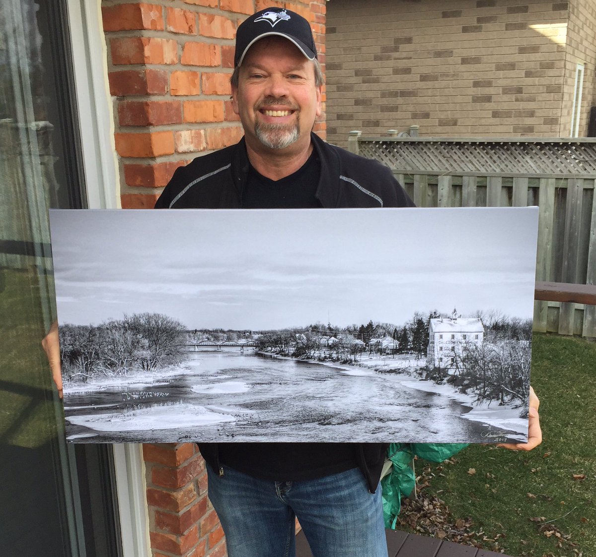 SOLD this 18x36 canvas wrap #blackandwhitephotography #canvas #canvasprints #canvaswraps #winter #photographer #oldmill #grandriver #bridge