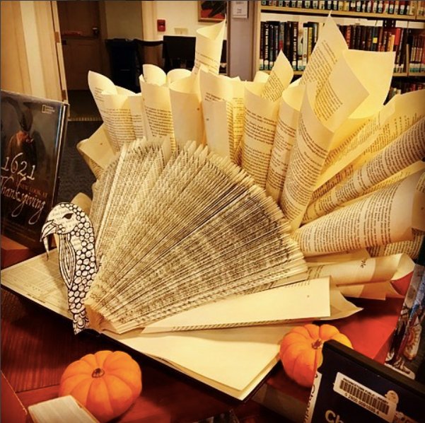 One of my favorite centerpieces/patron-magnets ever - a book turkey for our display of Thanksgiving materials! #lis453onlineSP17