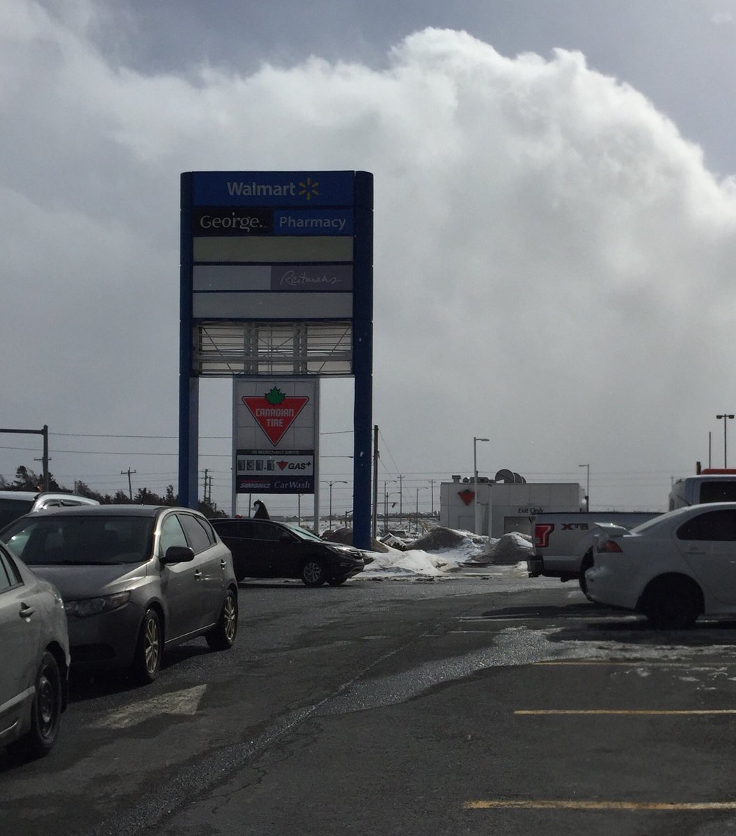 atkinsoc123's tweet photo. @Devin_Heroux @CBCNL   Pieces of the sign blew off and damaged cars in Tim Hortons parking lot https://t.co/SQanuabNDu
