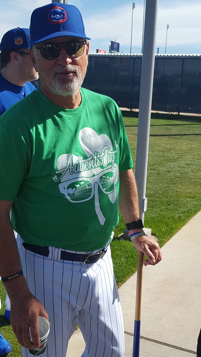 Joe Maddon debuts new shirts from @KorkedBaseball. That 8-7 umbrella is a theme