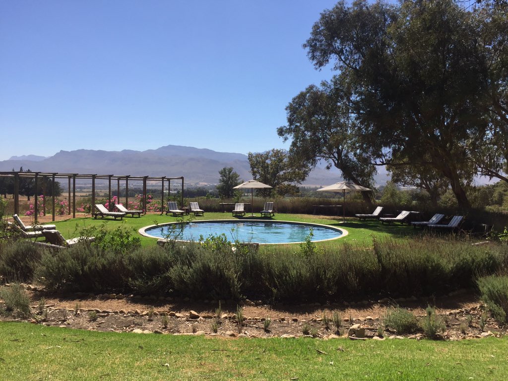 onecrapguy's tweet photo. Another TOUGH day at @BoschendalFarm Relaxing at the pool by #OrchardCottages ahead of the #LonJon wedding! https://t.co/80NOQZoxgd