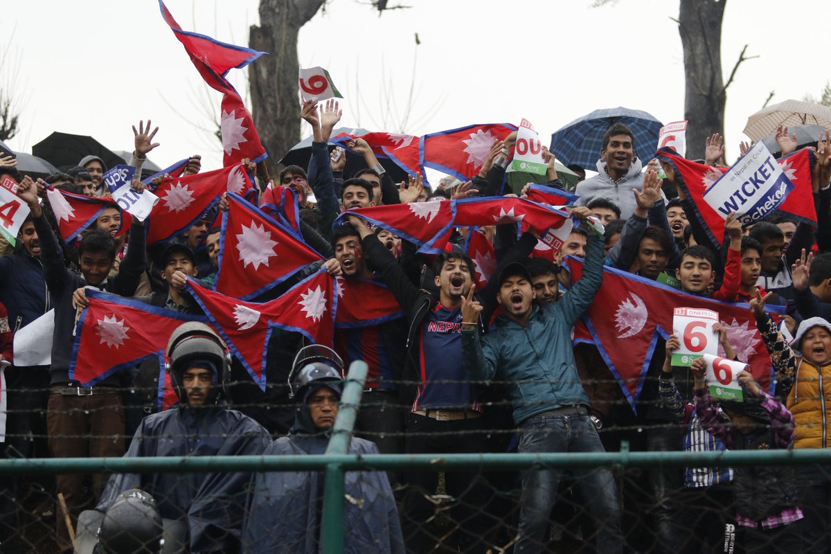 ICC's tweet photo. Come rain or shine, Nepal's fans will be there for the team! #ShotOfTheDay https://t.co/dSwuPr6ewB