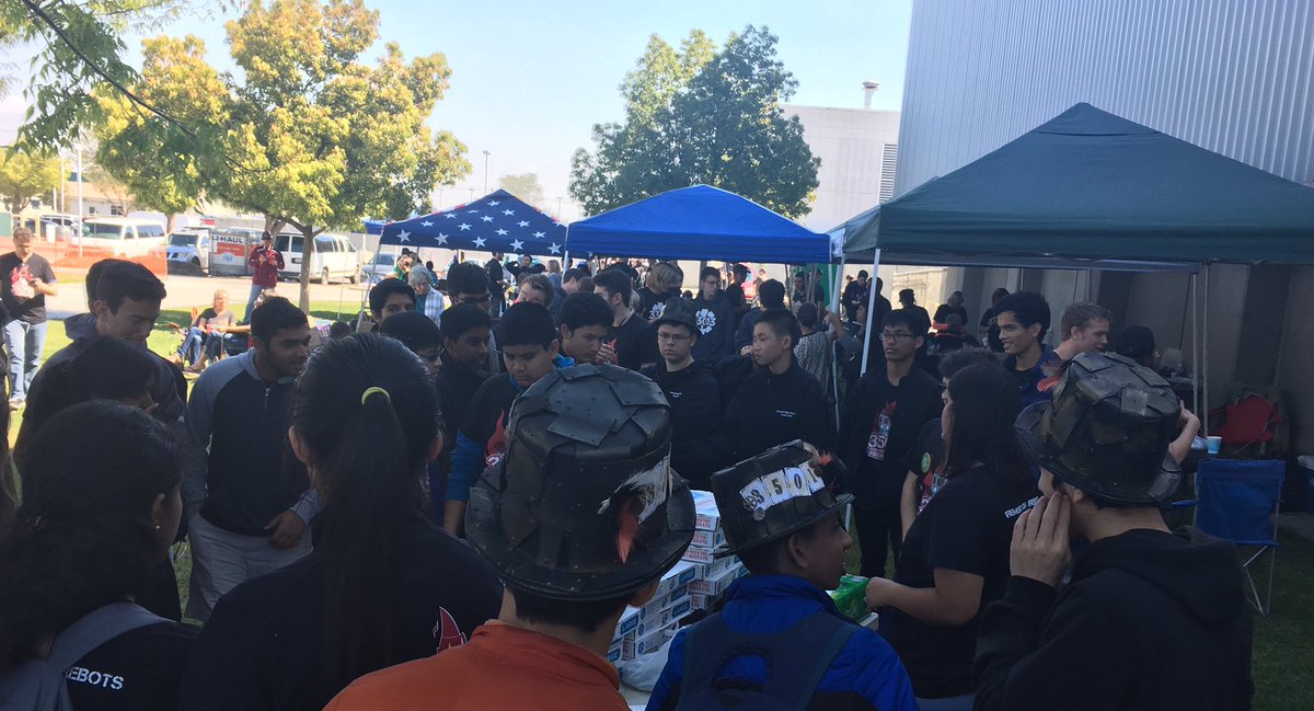 frc3501's tweet photo. We are hungrily congregated around our lunch as we listen to a team debrief.
#firebots3501 #firststeamworks #cvr https://t.co/xutaML97By
