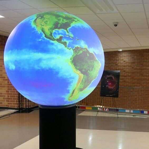 DirectorMSiC's tweet photo. Science on a Sphere at our STEM fair. Unveiling larger SOS at our 50th anniversary celebration April 29th. Register on our website. https://t.co/oqHIYD9pBA