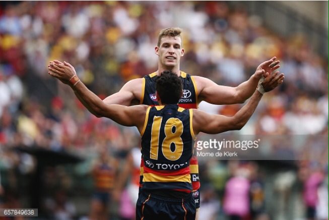 A couple of guns. Eddie Betts and Josh Jenkins celebrate #adelaidecrows #afc #crowsvgiants #gettysport #afl