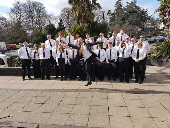 LydneyBand's tweet photo. Throwback to the West of England Area. MD Kevin is clearly happy with the band's performance! #regs2017 https://t.co/2BSivgQDX6