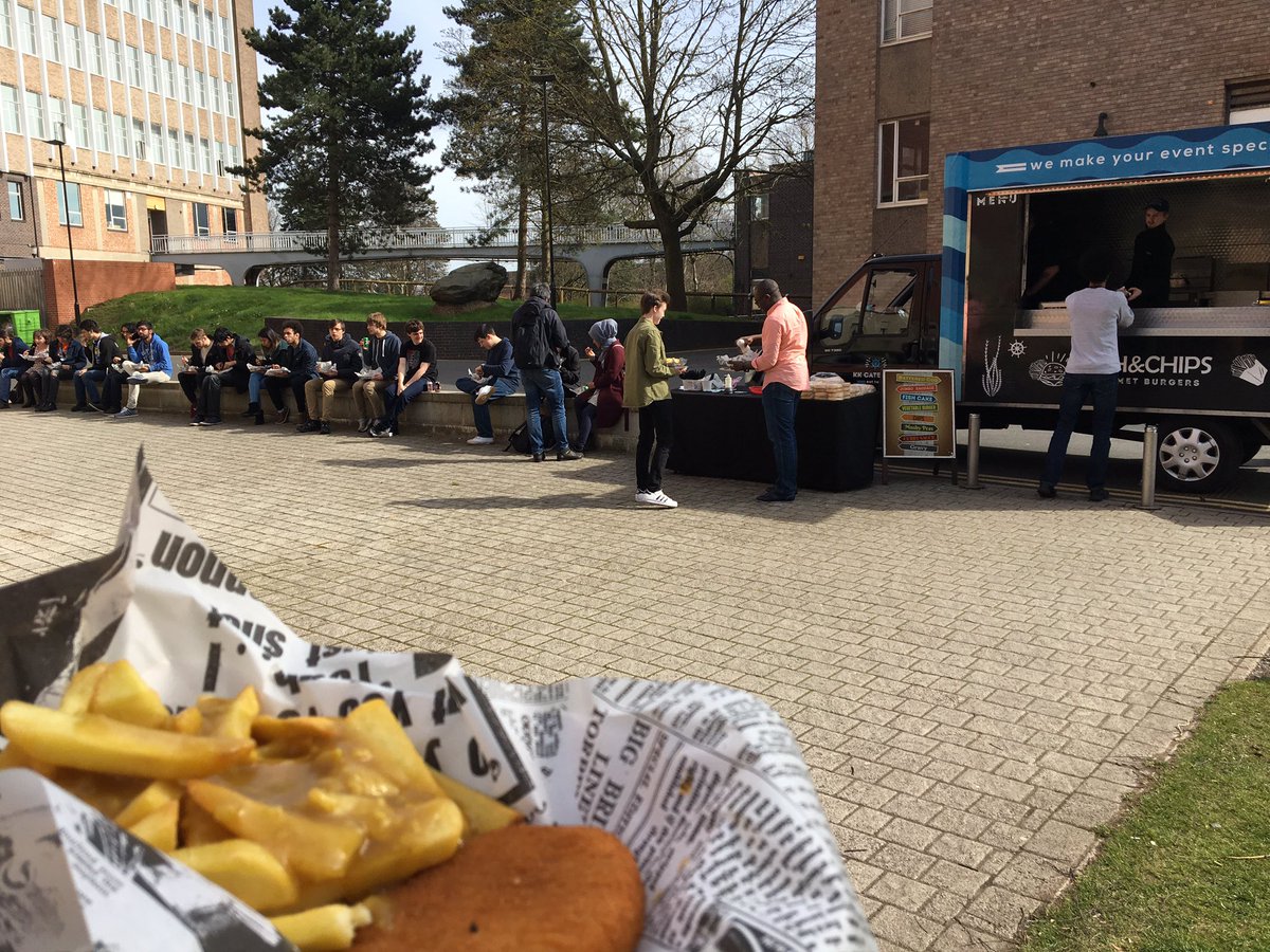 BrumHack's tweet photo. Fish and chips out in the sun... it's lunchtime here at #brumhack https://t.co/7REpXJdG3s