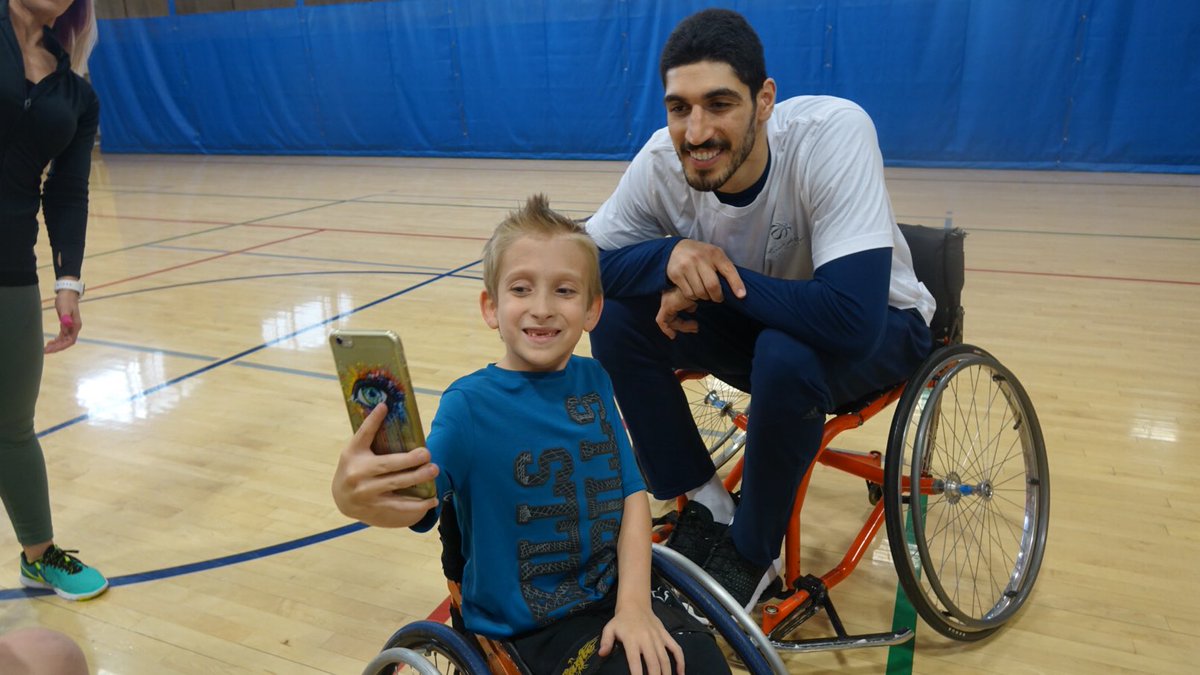 okcthunder's tweet photo. Enes Kanter gets inspired by wheelchair hoopsters! Watch this from his recent day with @OKASAsport https://t.co/EKh0xnx36p https://t.co/ANj5zXVJps