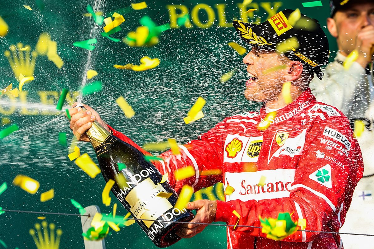 sebvettelnews's tweet photo. Sebastian Vettel celebrates on the podium, after his #AusGP 🇦🇺 victory 🍾🎉

#Seb5 #F1 https://t.co/logubiFbn4
