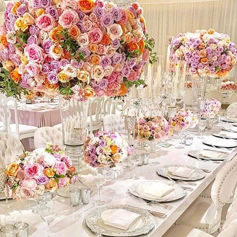 Spring is here! Love these arrangements of roses in lavender, yellow, peach and pink hues ~ Celio's Design
