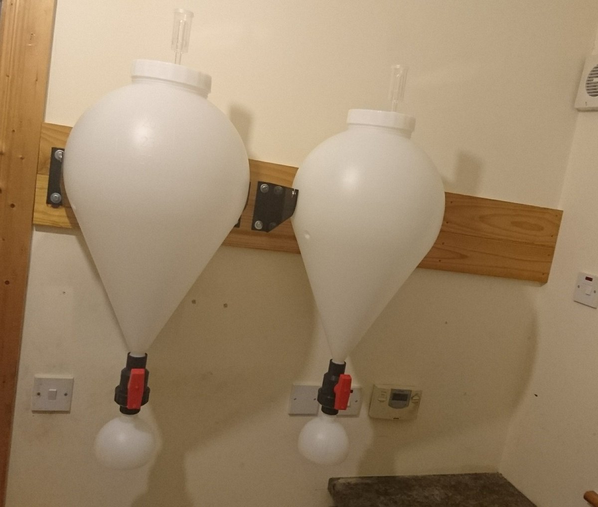 fixtronix's tweet photo. Two of my three #FastFerment units are mounted, sealed and full of water for an overnight leak test. Wish me luck @thefastrack! #HomeBrew :) https://t.co/mGKfzMXtRR